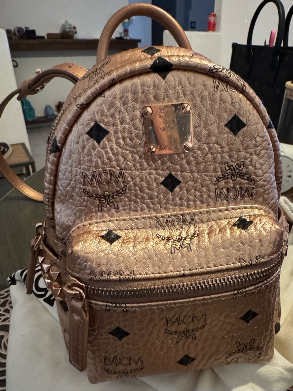 MCM Metallic Rose Gold Mini Backpack